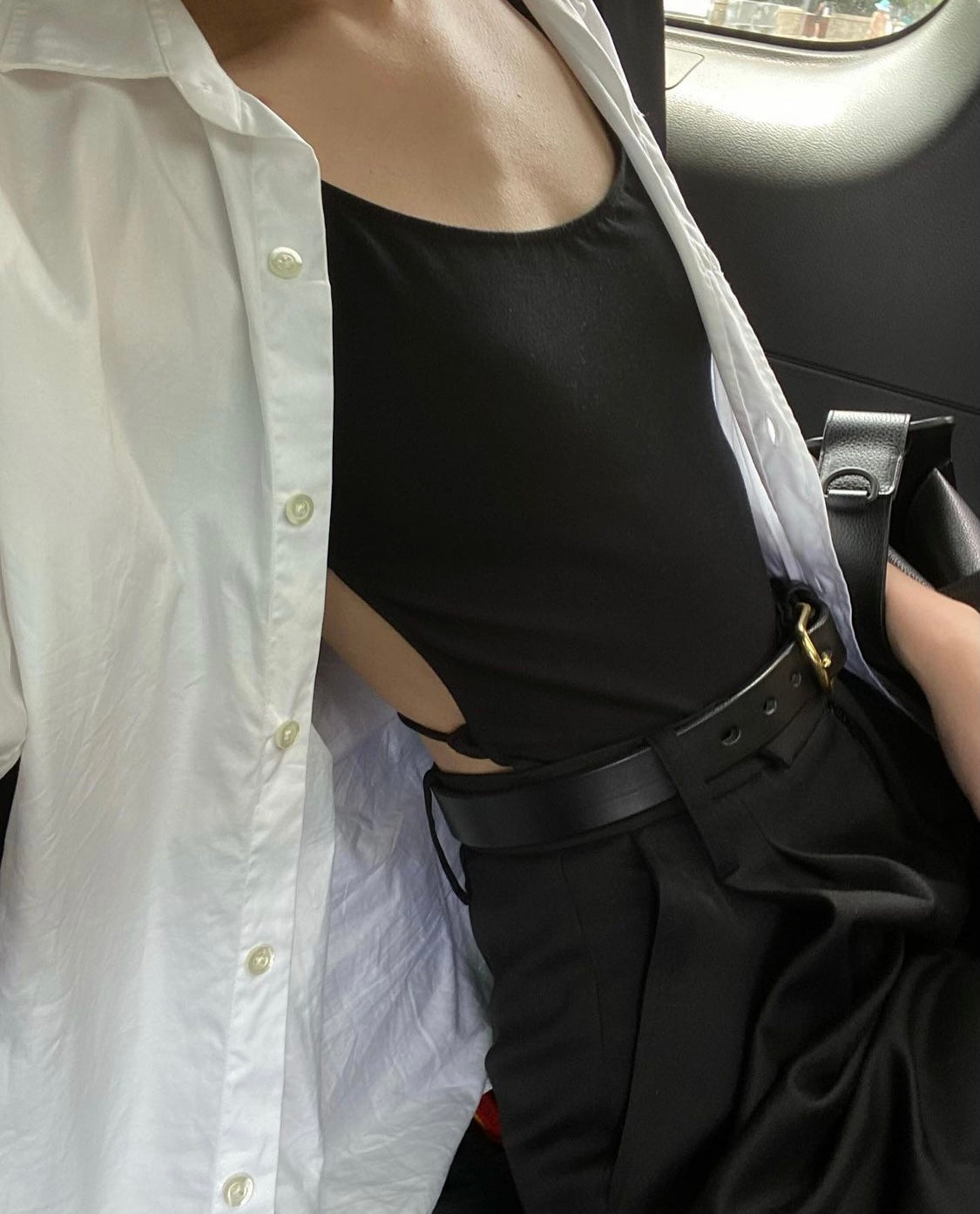 SAINT classic leather belt in black leather with solid brass buckle. made in Australia using traditional leather smith techniques. 100% Italian leather. worn by Christie Tyler